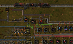 Pictured: my current setup in Factorio, a game that helps me feel like I have control over anything in my life.