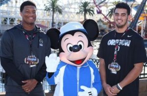 (December 27, 2014) - Florida State quarterback Jameis Winston (left) and Oregon quarterback Marcus Mariota (right), the two most recent Heisman Trophy winners, pose with Mickey Mouse in front of Mickey&apos;s Fun Wheel in Disney California Adventure park in Anaheim, Calif., on Saturday during their teams&apos; first official Rose Bowl Game week appearance. (Scott Brinegar/Disneyland) (PRNewsFoto/Disneyland Resort)