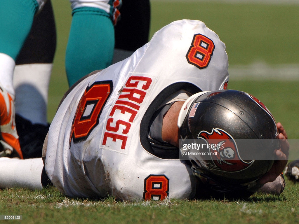 Tampa Bay Buccaneers quarterback Brian Griese falls with a leg injury in the second quarter against the Miami Dolphins October 16, 2005 in Tampa. The Bucs defeated the Dolphins 27-13.