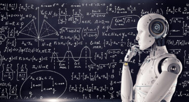 creative commons image of an AI robot in front of a chalkboard